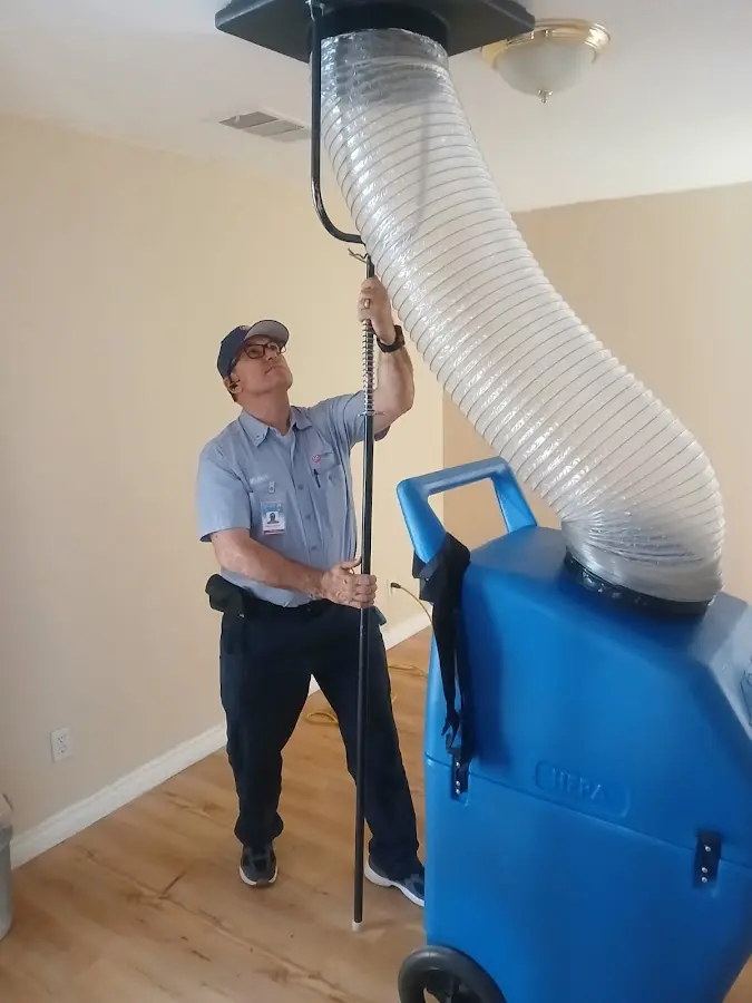 HVAC Installation technician using HEPA equipment in Pavilion